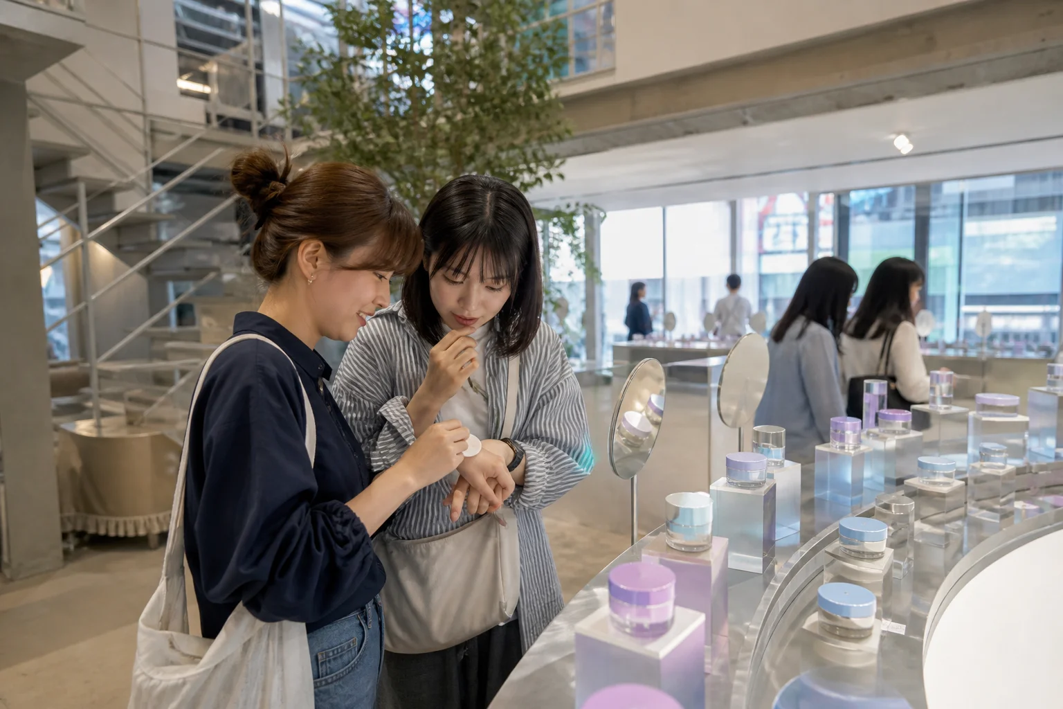 Friends testing skincare textures inside a youthful Hongdae beauty experience space